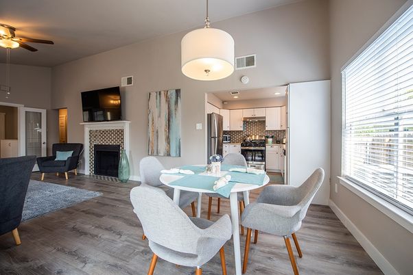Dining room, Fireplace, Interior, Kitchen, Pendant Lights, Recessed Lighting, Stainless Steel Appliances, Wood Texture Flooring