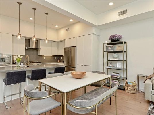 Dining room, Interior, Kitchen, Pendant Lights, Recessed Lighting, Stainless Steel Appliances, Wood Texture Flooring