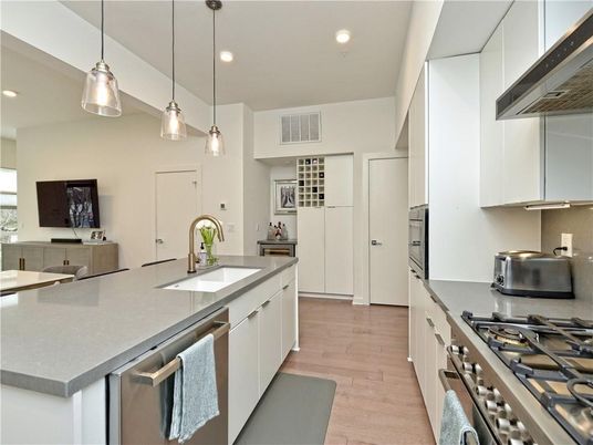 Interior, Kitchen, Pendant Lights, Recessed Lighting, Stainless Steel Appliances, Wood Texture Flooring