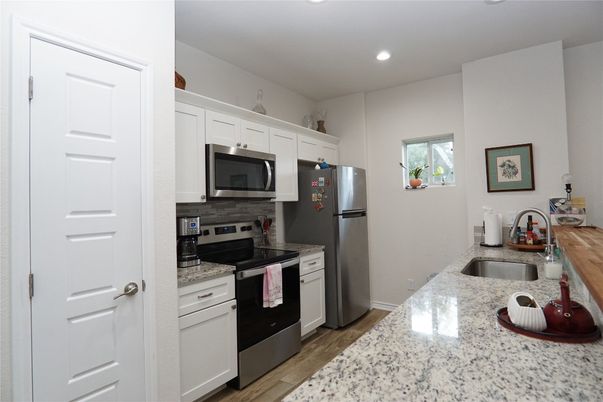 Interior, Kitchen, Recessed Lighting, Stainless Steel Appliances, Wood Texture Flooring