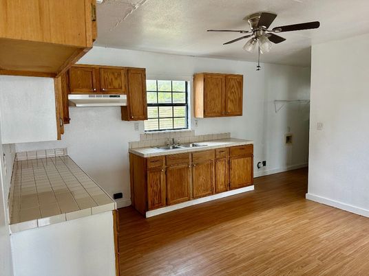 Interior, Kitchen, Tile Countertops, Wood Texture Flooring
