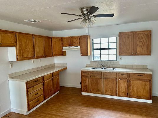Interior, Kitchen, Tile Countertops, Wood Texture Flooring