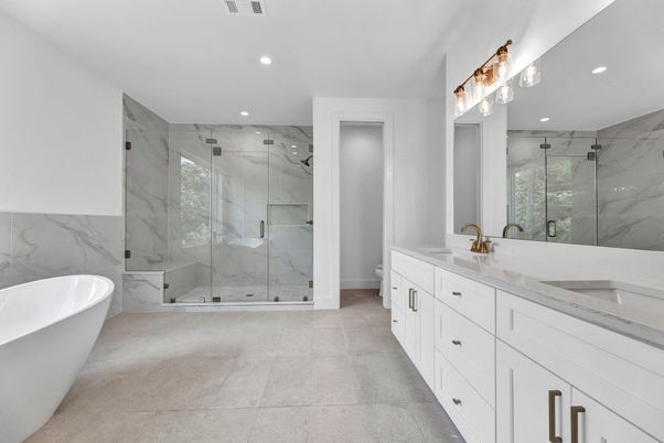 Bathroom, Dual Sink Vanities, Free Standing Baths, Glass Shower, Interior, Marble Walls, Recessed Lighting