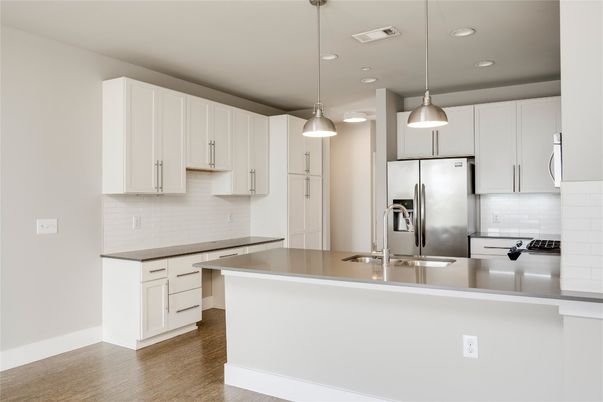 Interior, Kitchen, Pendant Lights, Recessed Lighting, Stainless Steel Appliances, Wood Texture Flooring