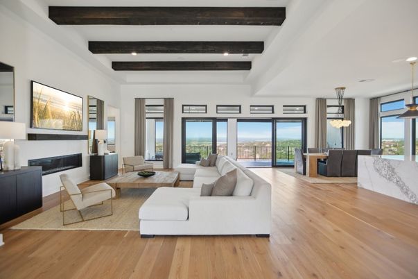 Dining room, Fireplace, Interior, Living room, Pendant Lights, Recessed Lighting, Water, Wooden Beams, Wood Texture Flooring