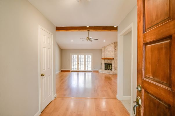 Empty room, Fireplace, Interior, Recessed Lighting, Wooden Beams, Wood Texture Flooring