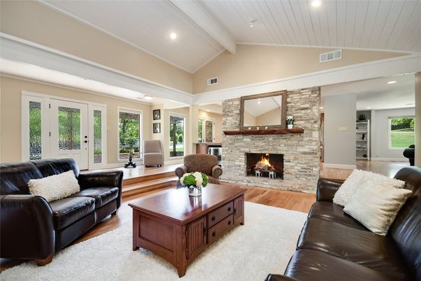 Fireplace, Interior, Living room, Recessed Lighting, Stone Walls, Wood Texture Flooring
