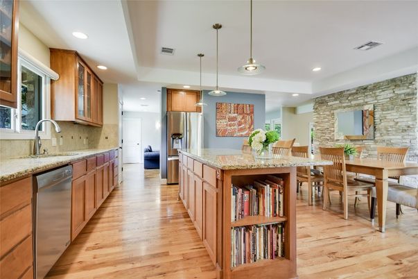 Dining room, Interior, Kitchen, Pendant Lights, Recessed Lighting, Stainless Steel Appliances, Stone Walls, Wood Texture Flooring