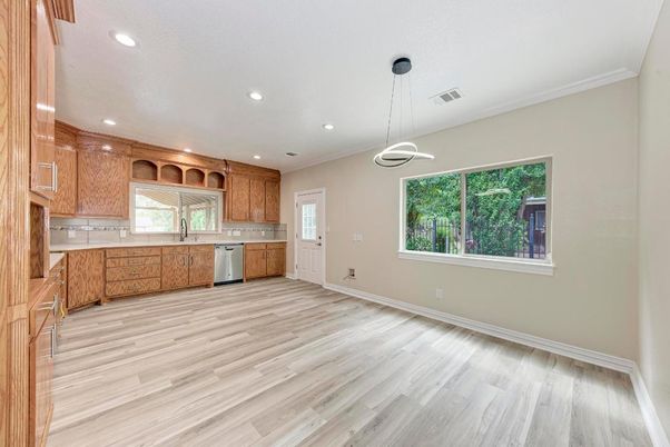 Interior, Kitchen, Pendant Lights, Recessed Lighting, Stainless Steel Appliances, Wood Texture Flooring
