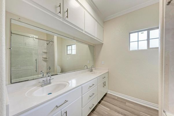 Bathroom, Dual Sink Vanities, Glass Shower, Interior, Wood Texture Flooring