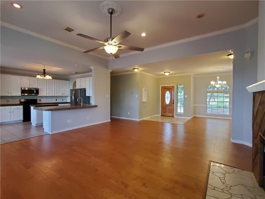 Chandelier, Empty room, Interior, Kitchen, Recessed Lighting, Stainless Steel Appliances, Wood Texture Flooring