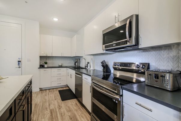 Interior, Kitchen, Recessed Lighting, Stainless Steel Appliances, Wood Texture Flooring