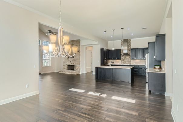 Fireplace, Interior, Kitchen, Pendant Lights, Recessed Lighting, Stainless Steel Appliances, Wood Texture Flooring