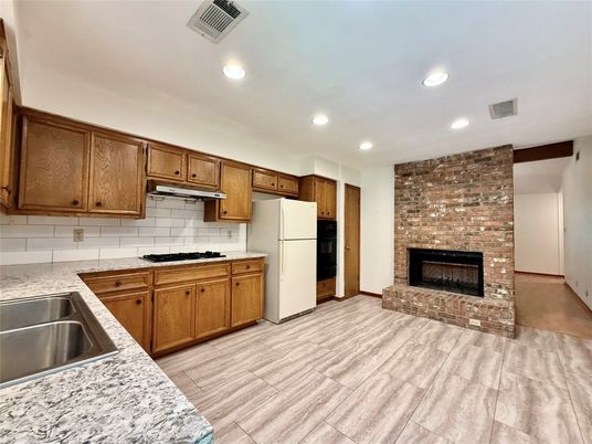 Fireplace, Interior, Kitchen, Recessed Lighting, Stone Walls