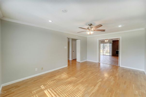 Empty room, Fireplace, Interior, Recessed Lighting, Stone Walls, Wood Texture Flooring