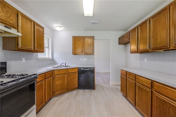 Interior, Kitchen, Tile Countertops, Wood Texture Flooring