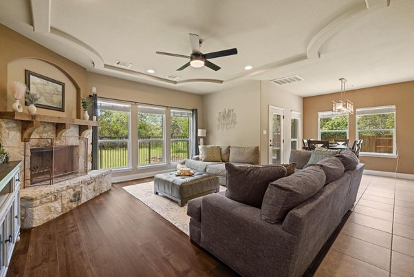 Dining room, Fireplace, Interior, Living room, Pendant Lights, Recessed Lighting, Wood Texture Flooring