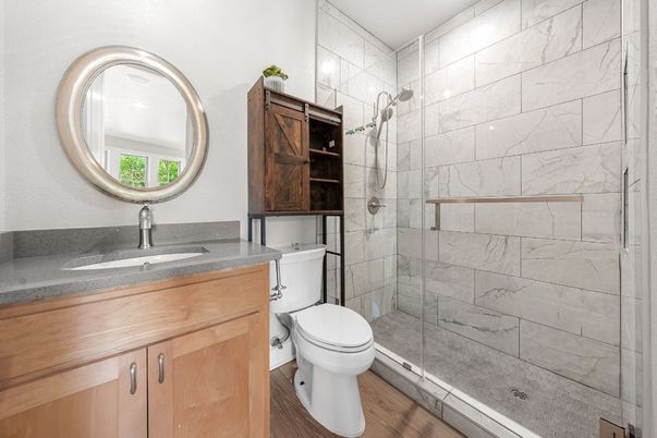 Bathroom, Glass Shower, Interior, Marble Walls, Wood Texture Flooring