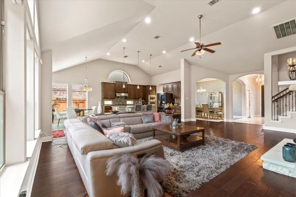 Chandelier, Dining room, Interior, Kitchen, Living room, Pendant Lights, Recessed Lighting, Stainless Steel Appliances, Wood Texture Flooring