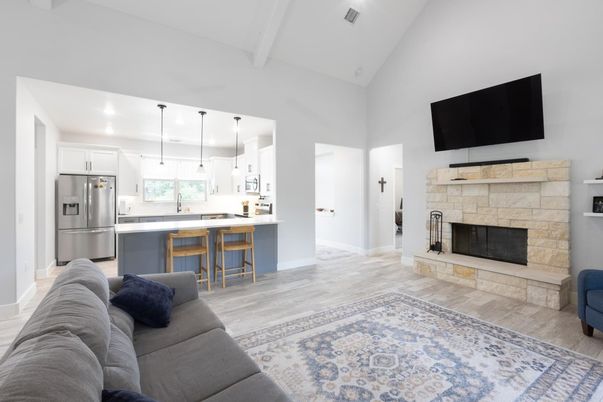 Fireplace, Interior, Kitchen, Living room, Pendant Lights, Recessed Lighting, Stainless Steel Appliances, Wood Texture Flooring