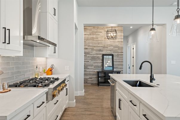 Interior, Kitchen, Pendant Lights, Recessed Lighting, Stainless Steel Appliances, Stone Walls, Wood Texture Flooring