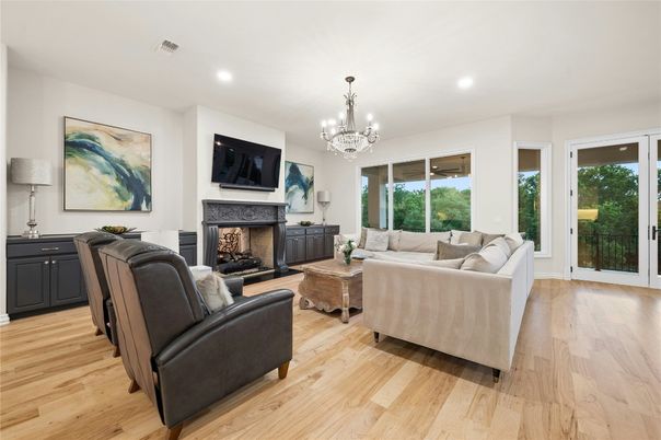 Chandelier, Fireplace, Interior, Living room, Recessed Lighting, Wood Texture Flooring