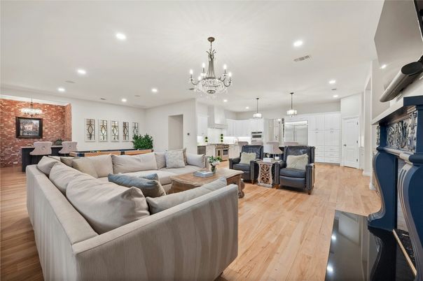 Chandelier, Dining room, Interior, Kitchen, Living room, Pendant Lights, Recessed Lighting, Stone Walls, Wood Texture Flooring