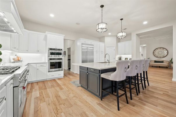 Interior, Kitchen, Pendant Lights, Recessed Lighting, Stainless Steel Appliances, Wood Texture Flooring