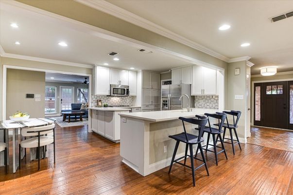 Dining room, Interior, Kitchen, Recessed Lighting, Stainless Steel Appliances, Wood Texture Flooring