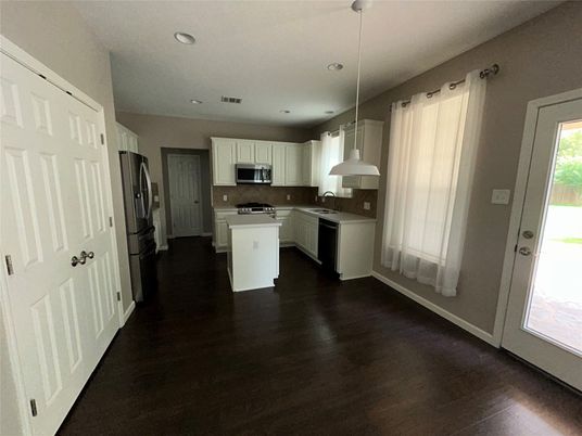 Interior, Kitchen, Pendant Lights, Recessed Lighting, Stainless Steel Appliances, Wood Texture Flooring