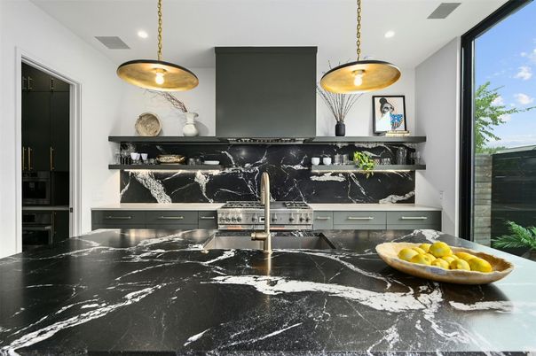 Interior, Kitchen, Marble Walls, Pendant Lights, Recessed Lighting, Stainless Steel Appliances