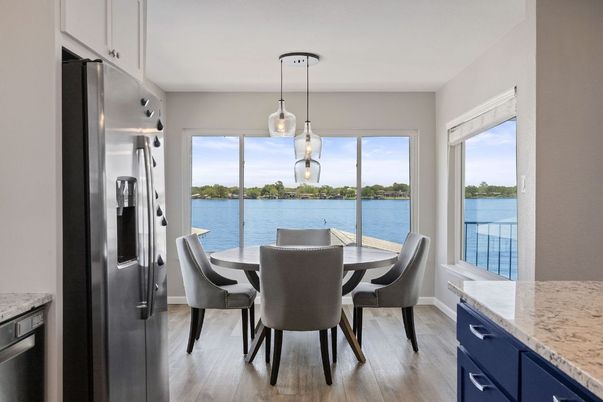 Dining room, Interior, Kitchen, Pendant Lights, Stainless Steel Appliances, Water, Wood Texture Flooring