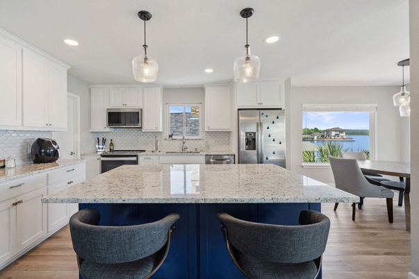 Dining room, Interior, Kitchen, Pendant Lights, Recessed Lighting, Stainless Steel Appliances, Water, Wood Texture Flooring