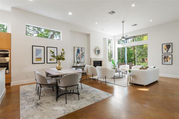 Dining room, Fireplace, Interior, Living room, Pendant Lights, Recessed Lighting, Wood Texture Flooring