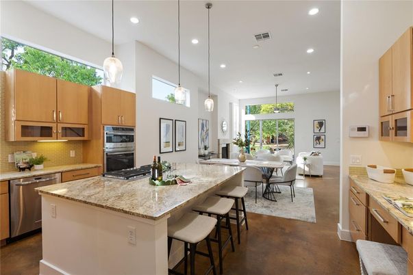 Dining room, Interior, Kitchen, Pendant Lights, Recessed Lighting, Stainless Steel Appliances, Wood Texture Flooring