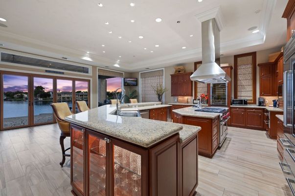 Dining room, Interior, Kitchen, Recessed Lighting, Stainless Steel Appliances, Water, Wood Texture Flooring