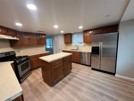 Interior, Kitchen, Recessed Lighting, Stainless Steel Appliances, Wood Texture Flooring