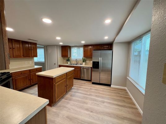 Interior, Kitchen, Recessed Lighting, Stainless Steel Appliances, Wood Texture Flooring