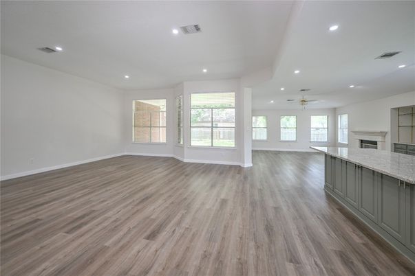 Empty room, Fireplace, Interior, Recessed Lighting, Wood Texture Flooring