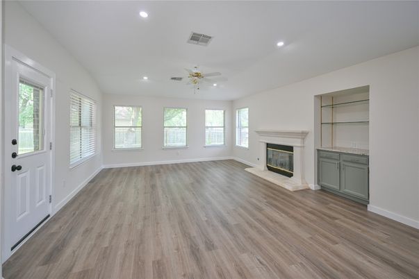 Empty room, Fireplace, Interior, Recessed Lighting, Wood Texture Flooring