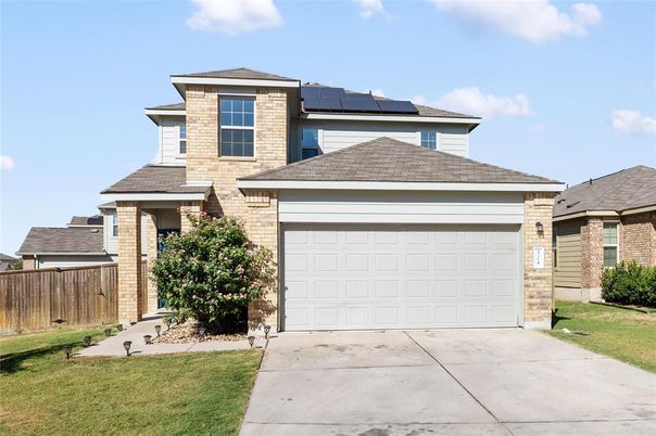Attached, Exterior, Facade, Brick Facade, Solar Panels, Brick Traditional
