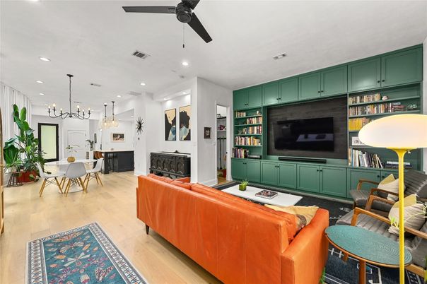Dining room, Fireplace, Interior, Living room, Pendant Lights, Recessed Lighting, Wood Texture Flooring