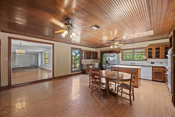 Chandelier, Dining room, Interior, Kitchen, Stainless Steel Appliances, Wooden Ceilings, Wood Texture Flooring