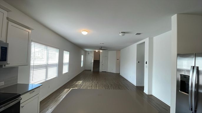 Empty room, Interior, Kitchen, Stainless Steel Appliances, Wood Texture Flooring