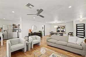 Dining room, Interior, Kitchen, Living room, Pendant Lights, Recessed Lighting, Stainless Steel Appliances, Wood Texture Flooring