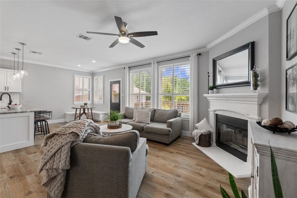 Dining room, Fireplace, Interior, Living room, Pendant Lights, Recessed Lighting, Wood Texture Flooring