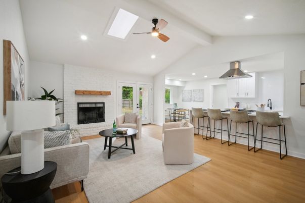 Fireplace, Interior, Kitchen, Living room, Recessed Lighting, Stone Walls, Wood Texture Flooring