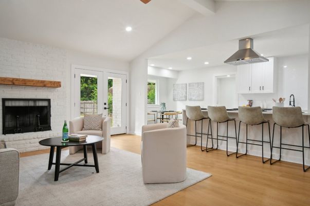 Dining room, Fireplace, Interior, Kitchen, Living room, Recessed Lighting, Stone Walls, Wood Texture Flooring
