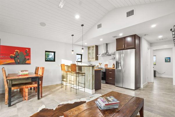 Dining room, Interior, Kitchen, Pendant Lights, Recessed Lighting, Stainless Steel Appliances, Wood Texture Flooring
