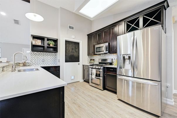 Interior, Kitchen, Pendant Lights, Recessed Lighting, Stainless Steel Appliances, Wood Texture Flooring